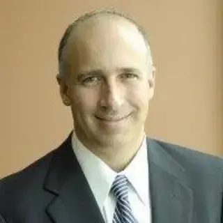 A headshot of Rabbi Claudio J. Kogan, Physician, Rabbi, and Ethicist.