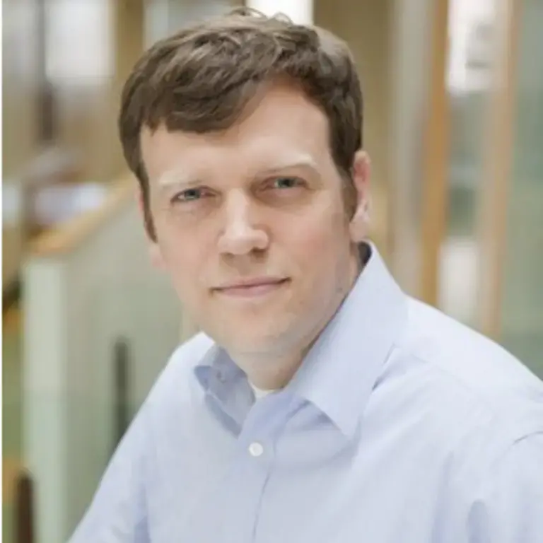 A headshot of the Academic Director of the Ecology, Evolution, and Environmental Biology program at Columbia University.
