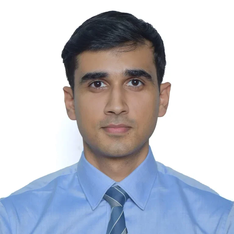 Vivek Singh in front of a white background