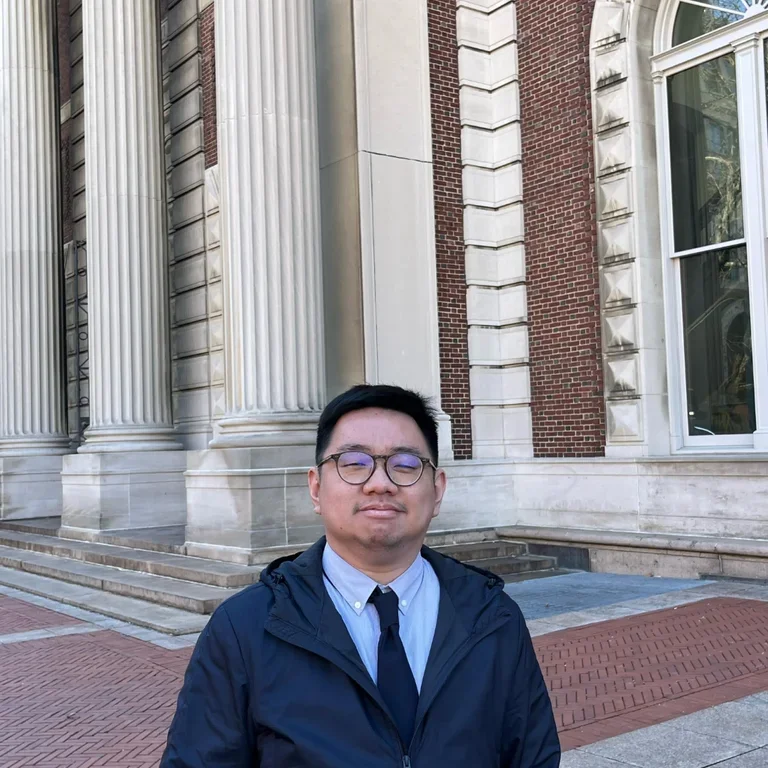 Boni Rosen standing in front of a academic building at Columbia University