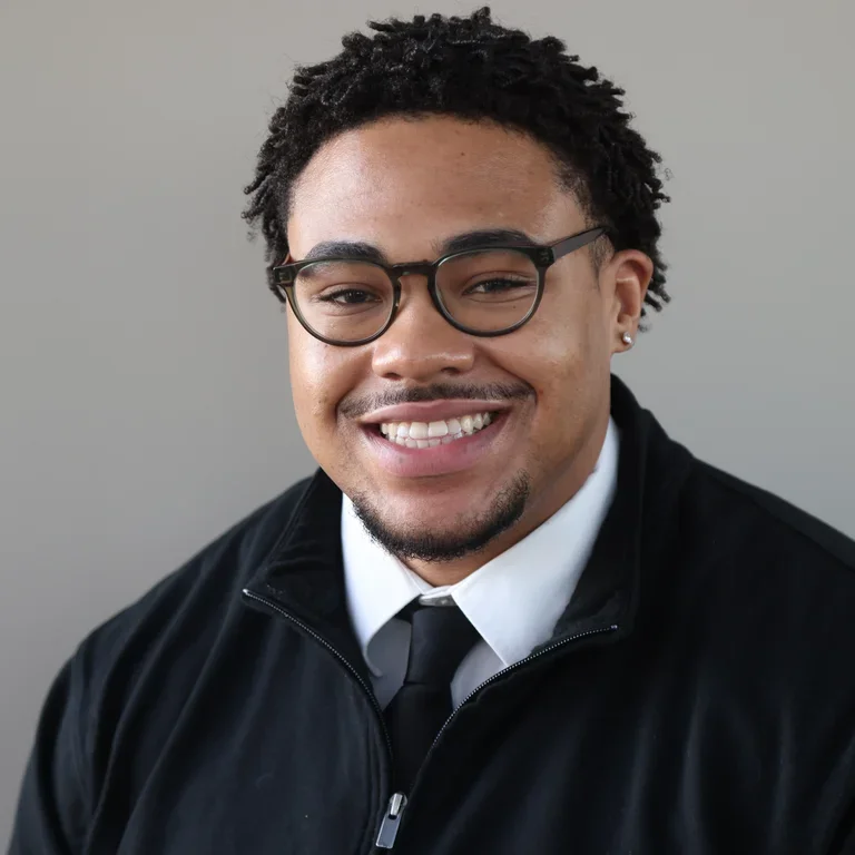 Professional headshot of IKNS student Isaiah Baker