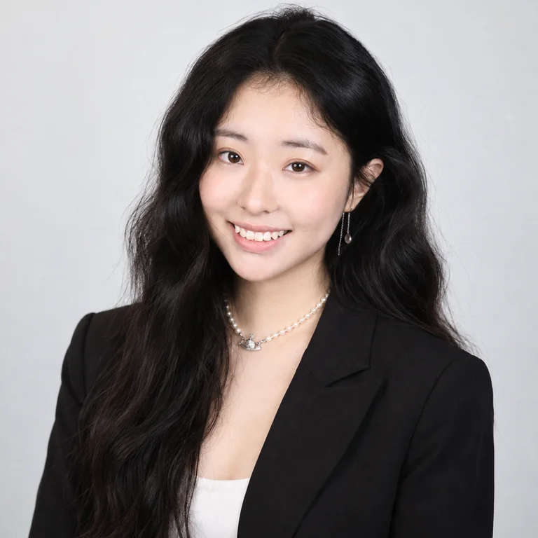 Professional photo of Rosemary Li with black blazer and smiling 
