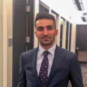 A headshot of Aryan Sheikhalian.