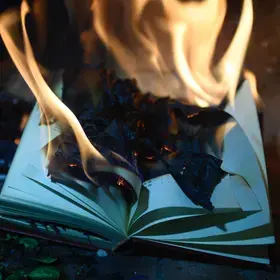 A stock image of a burning book.