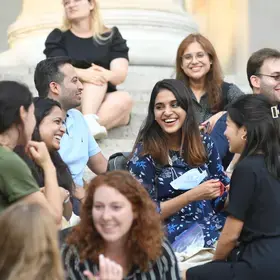SPS students socialize on the steps of Low Library, Fall 2021.