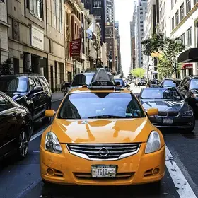 Traffic in NYC, close up on yellow cab