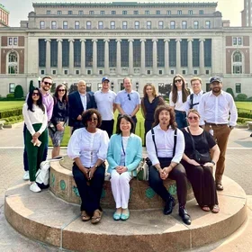 Students and faculty in front of Butler Library