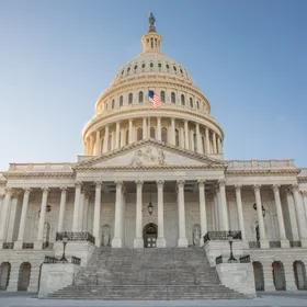 iStock - The Capitol Building in Washington, D.C. with bright blue sky.