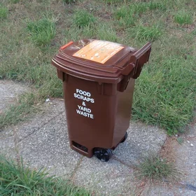 Brown compost bin used by the New York Department of Sanitation