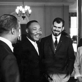 Martin Luther King, Jr., with "Owl" editor Wally Wood (center) and other students. Photo credit: Lawrence J. Howell