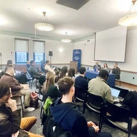 Students and guests gather at an ERM event