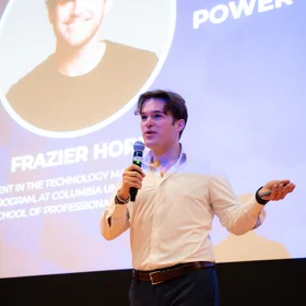TMGT alum Frazier Horn presenting at a conference