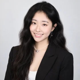 Professional photo of Rosemary Li with black blazer and smiling 
