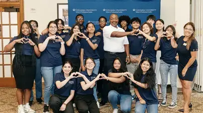 Gregory Robinson, lecturer from School of Professional Studies and former program director for the James Webb telescope mets with students from the Youth in Stem program