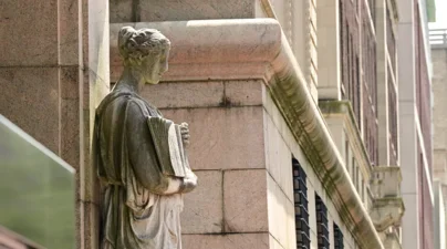 A statue at the Broadway gates of Columbia's Morningside Campus.