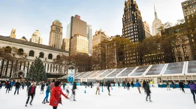Ice skaters enjoy the rink at Bryant Park 