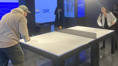 Students playing ping pong at IBM Innovation Studio