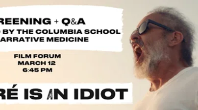 middle aged bearded man in sunglasses screaming into the horizon