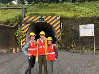 Olga Puntus (left) on a site visit in Latin America for J.P. Morgan.